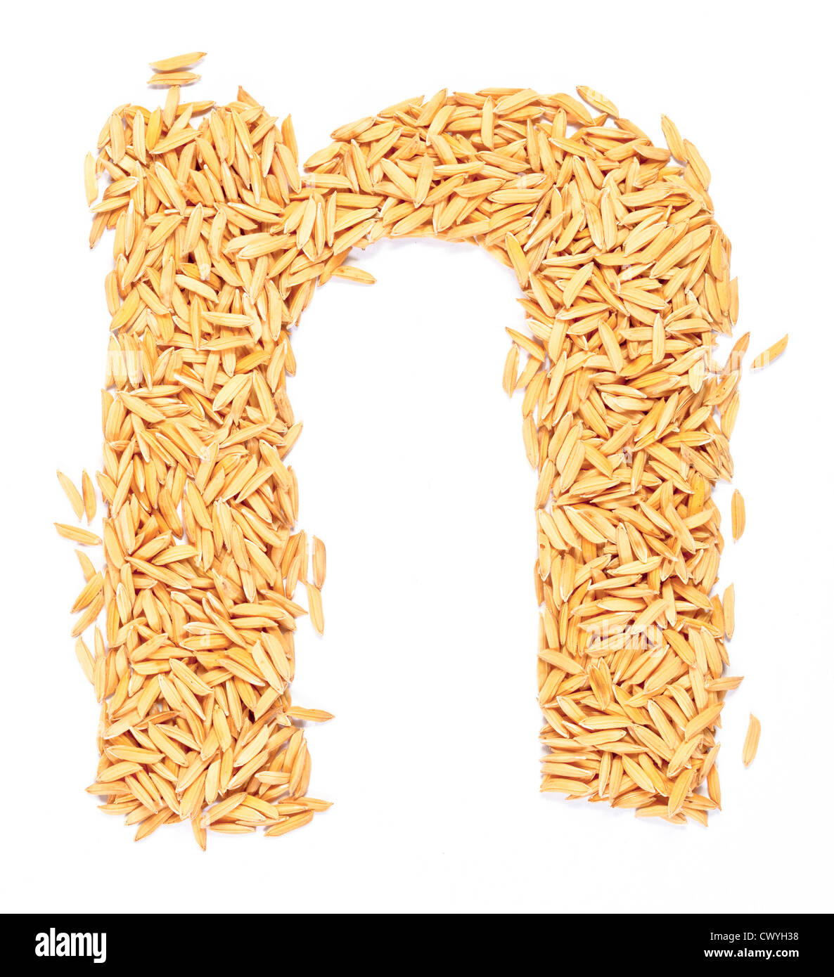 N, Alphabet, Schreiben von Paddy-Reis auf weiß Stockfoto