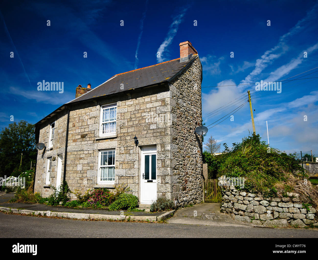 Granit gebauten Gebäude, typisches Landhaus in Constantine, ist seine sich selbst ein Granit Dorf auf einem West Cornwall Stockfoto