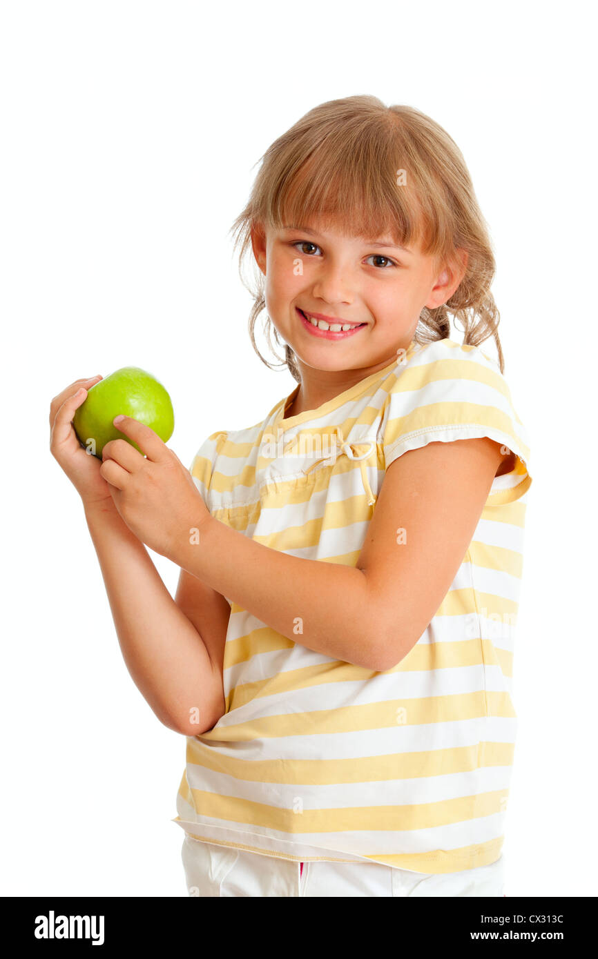 Schulmädchen-Porträt mit grünem Apfel, isoliert Stockfoto