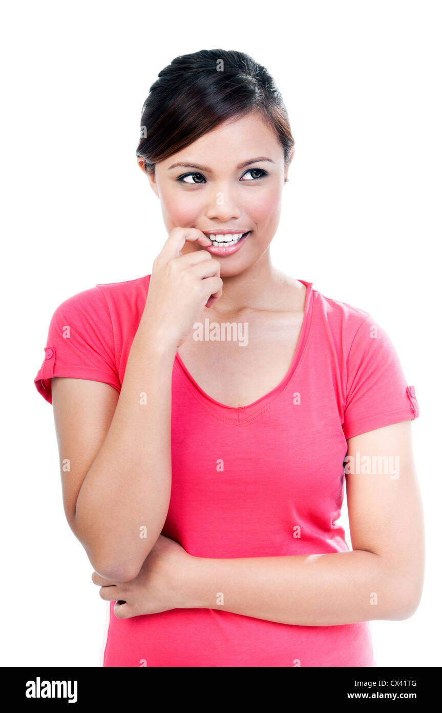 Hübsche junge Frau, die ihre Finger beißen Porträt Stockfotografie
