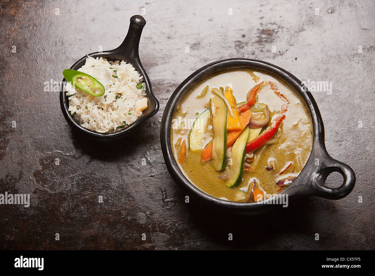 Thai green curry mit Kokosreis Stockfoto