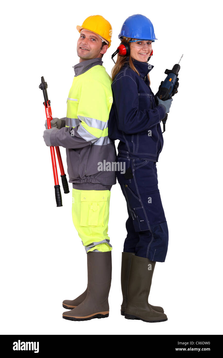 Männliche und weibliche Bauarbeiter Stockfoto