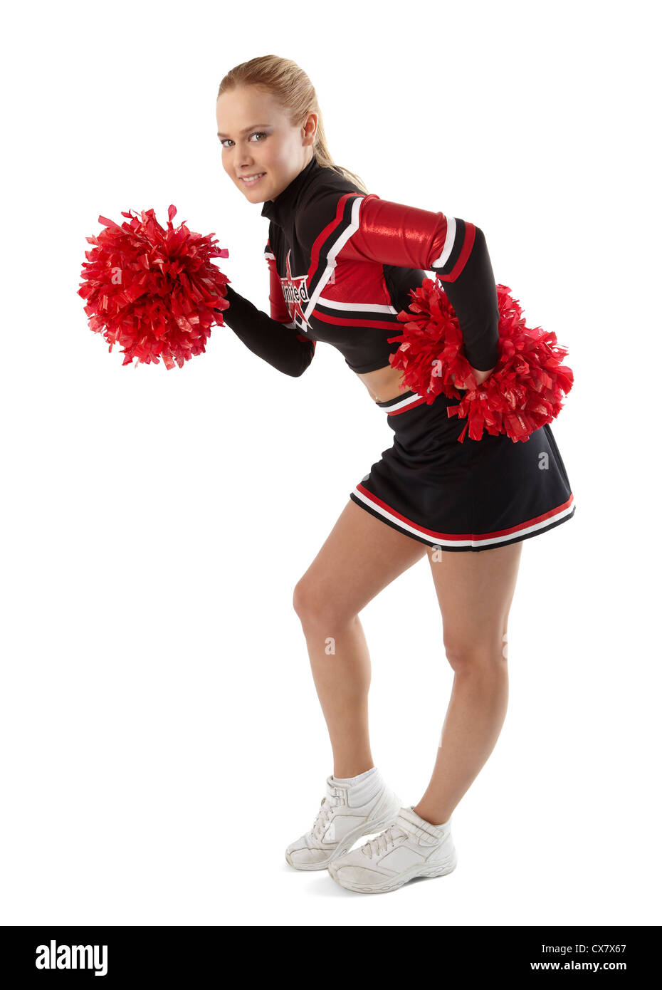 Cheerleader-pose Stockfoto