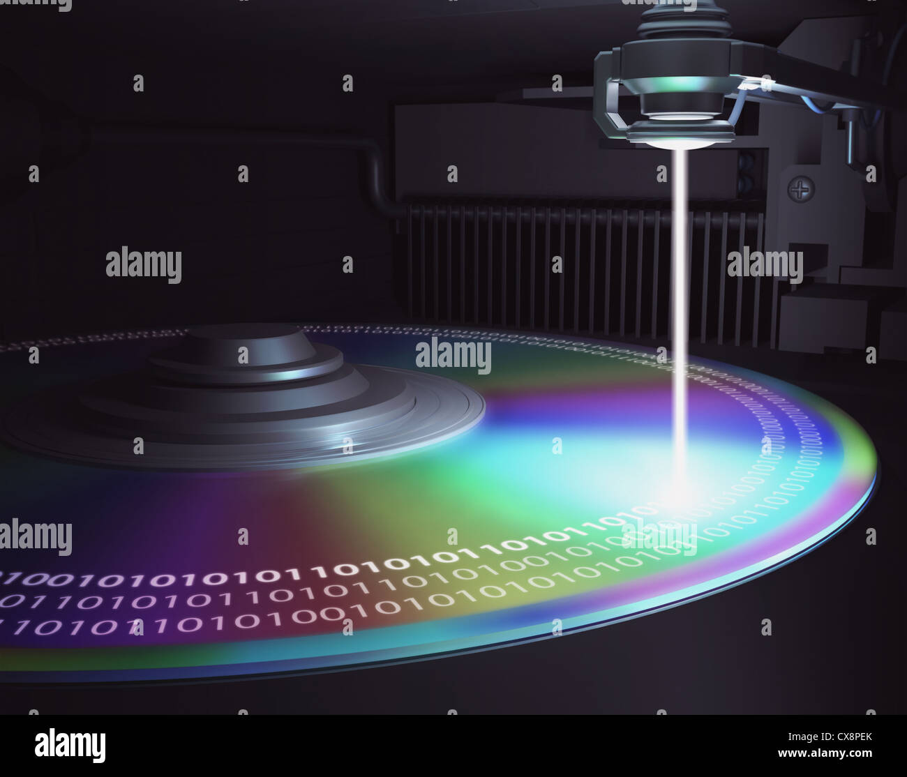 Der Laser schreibt Informationen auf Datenträger (CD, DVD, Blu-Ray). Konzept der Technologie und Zukunft. Stockfoto