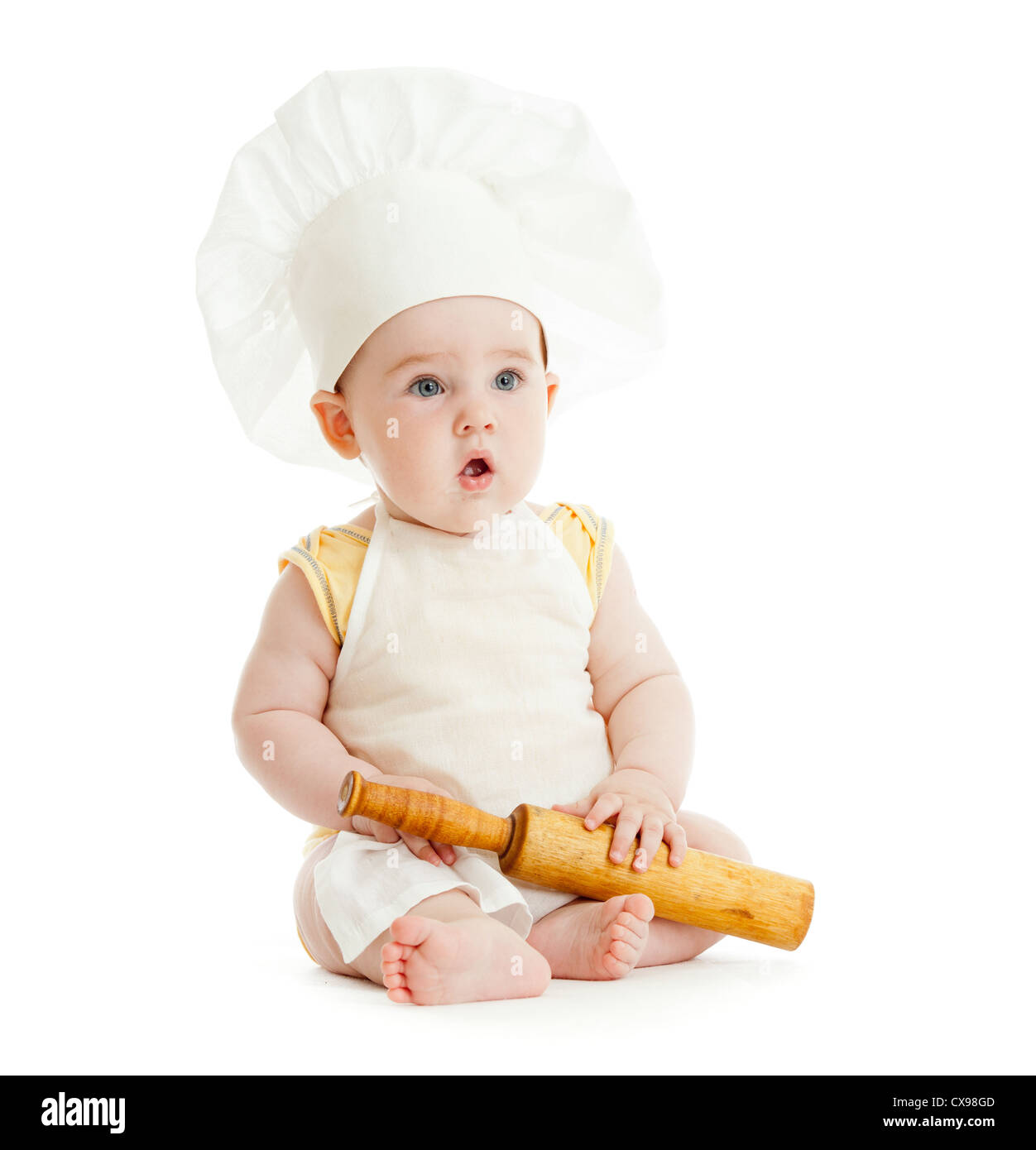 Kind mit Nudelholz und Kochen Hut isoliert Stockfoto