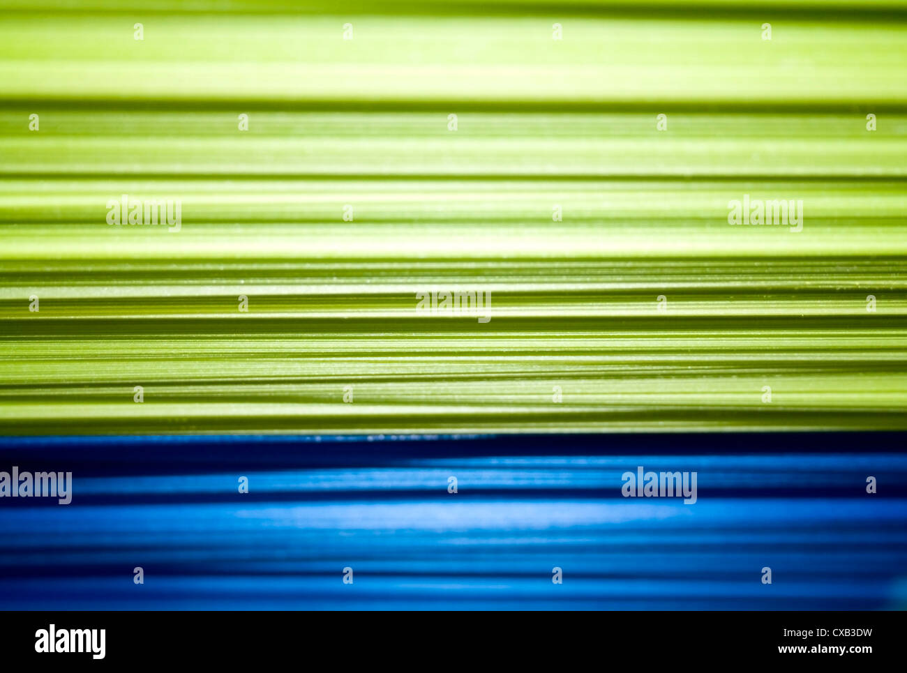 Grün und blau Kunststoffschichten - abstrakten Hintergrund Stockfoto