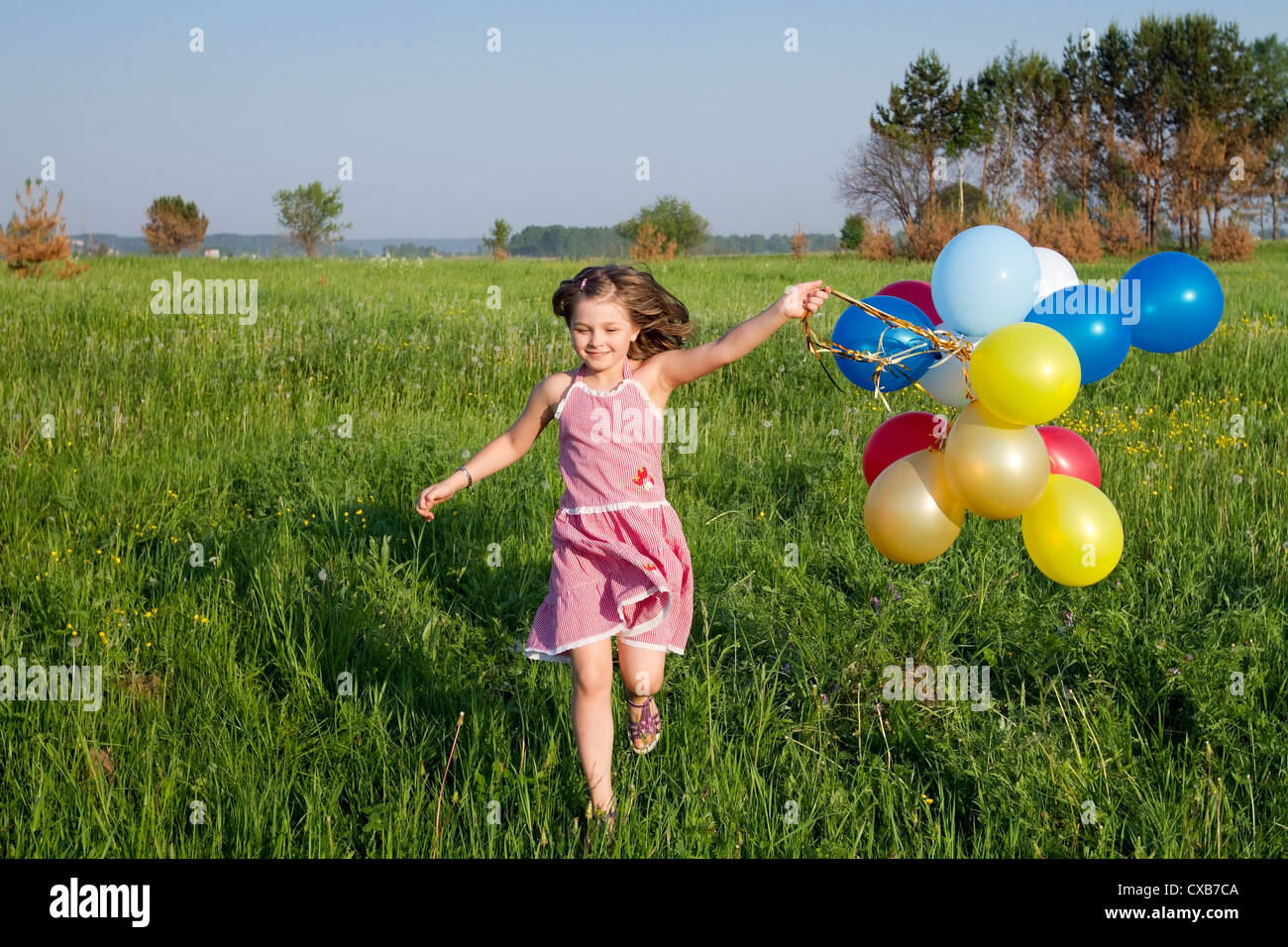 glückliche Sommer Mädchen Stockfoto