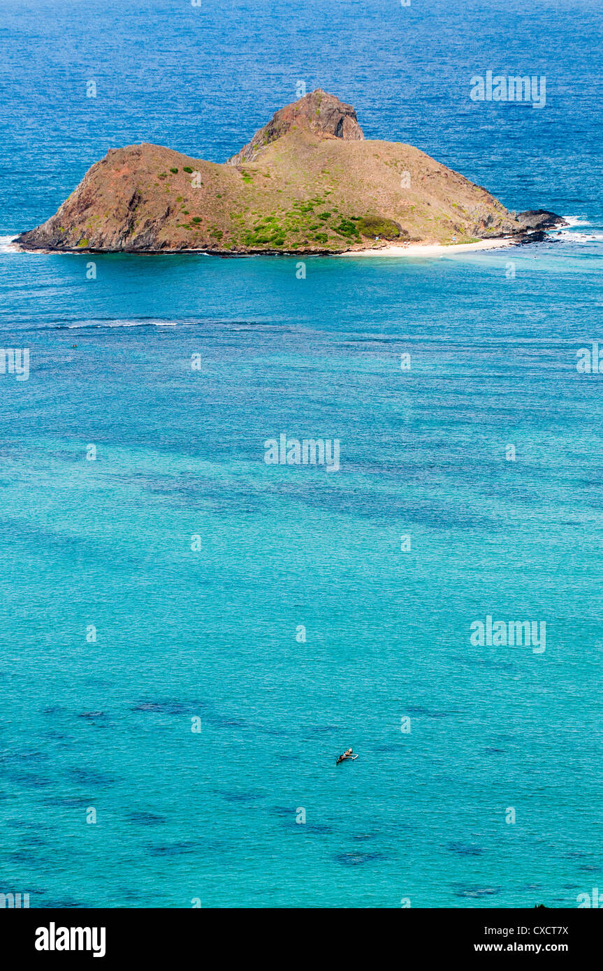 Ausleger-Kanu-Team aus Mokulua Inseln, Lanikai Beach, Kailua, Oahu, Hawaii Stockfoto