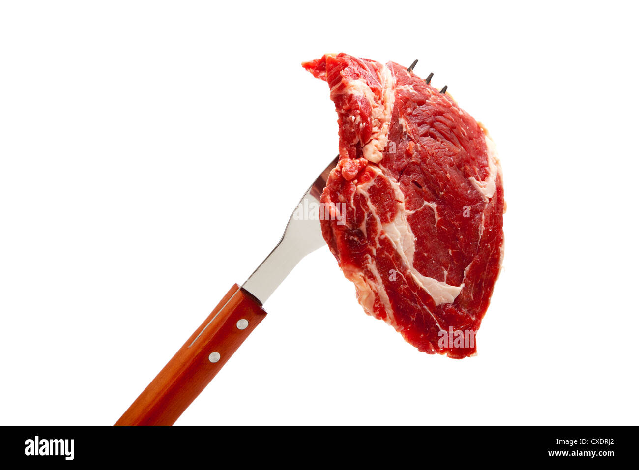 Ein Rind Ribeye Steak auf eine Gabel oder Grillen Kochgeschirr auf weißem Hintergrund mit Textfreiraum Stockfoto