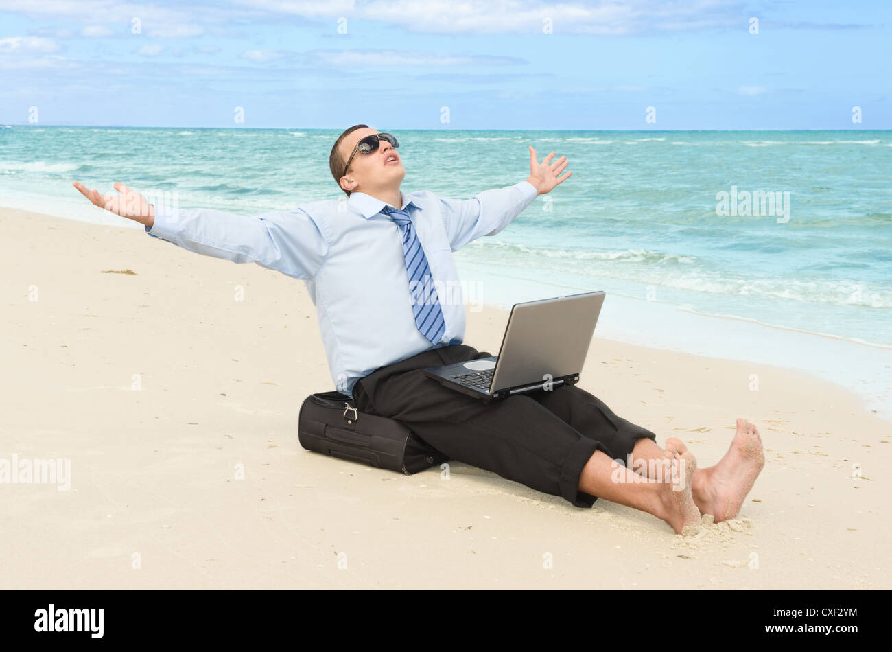 Geschäftsmann am Strand Stockfoto Geschäftsmann am Strand Stockfoto