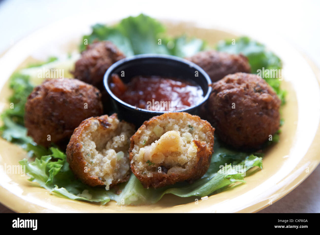 Conch Fritters serviert in einem Restaurant in Key West Florida usa Stockfoto