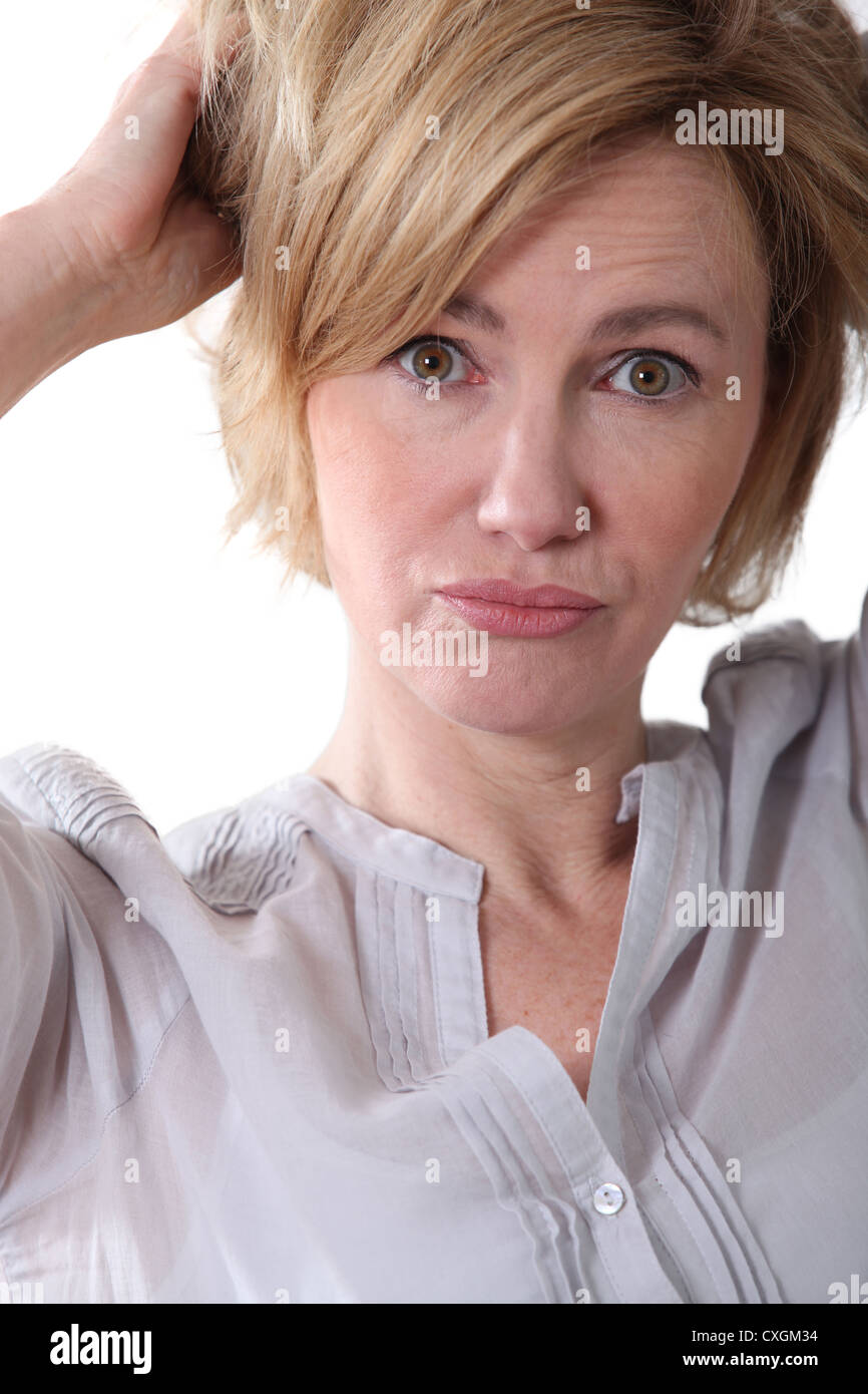 Frau mit einem verwirrten Ausdruck. Stockfoto