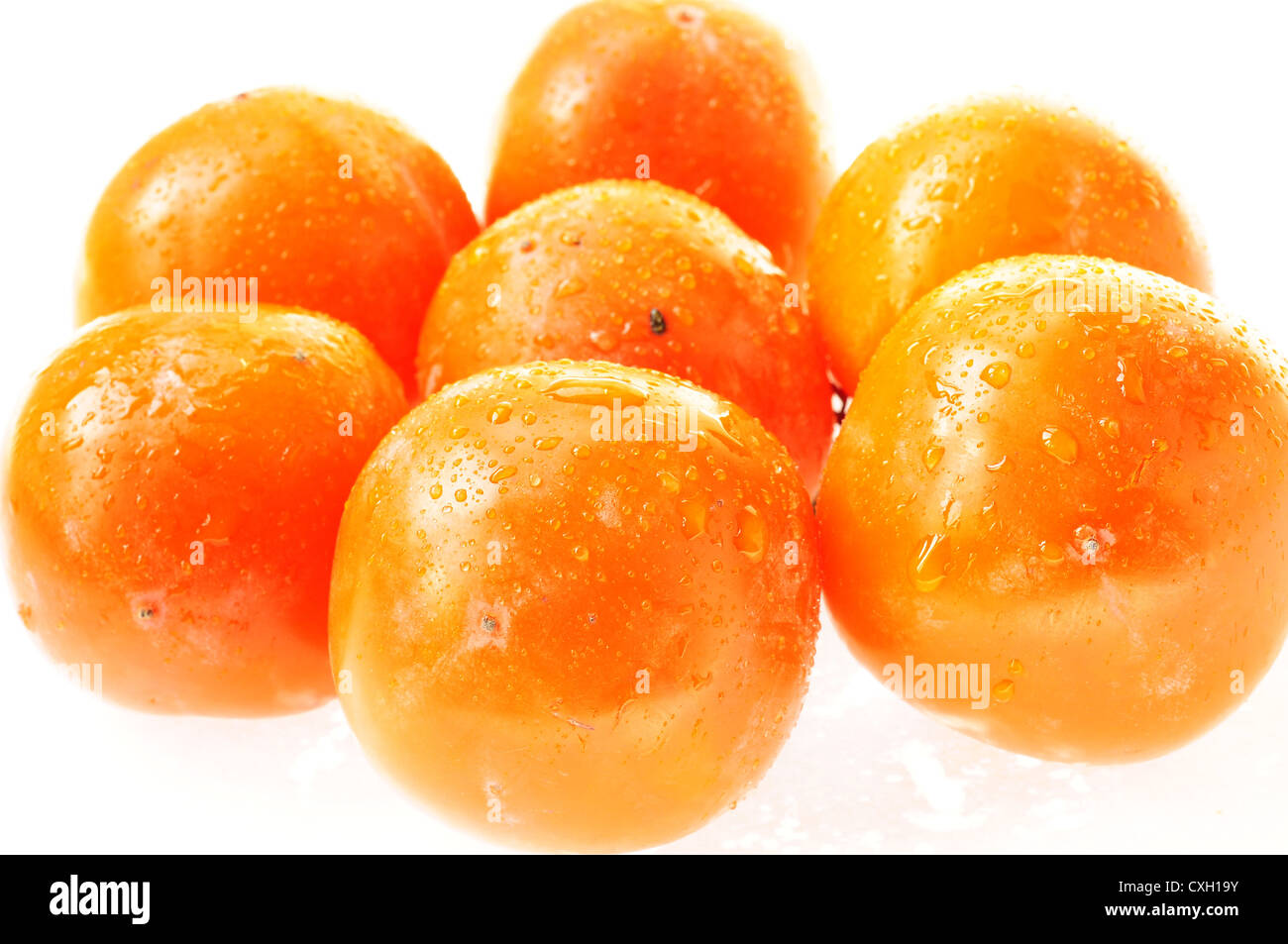 frische reife Persimmon orange süße gesunde Frucht tropischen Ernährung exotische roh asiatischen grünen Hintergrund Natur Closeup Ernährung Stockfoto