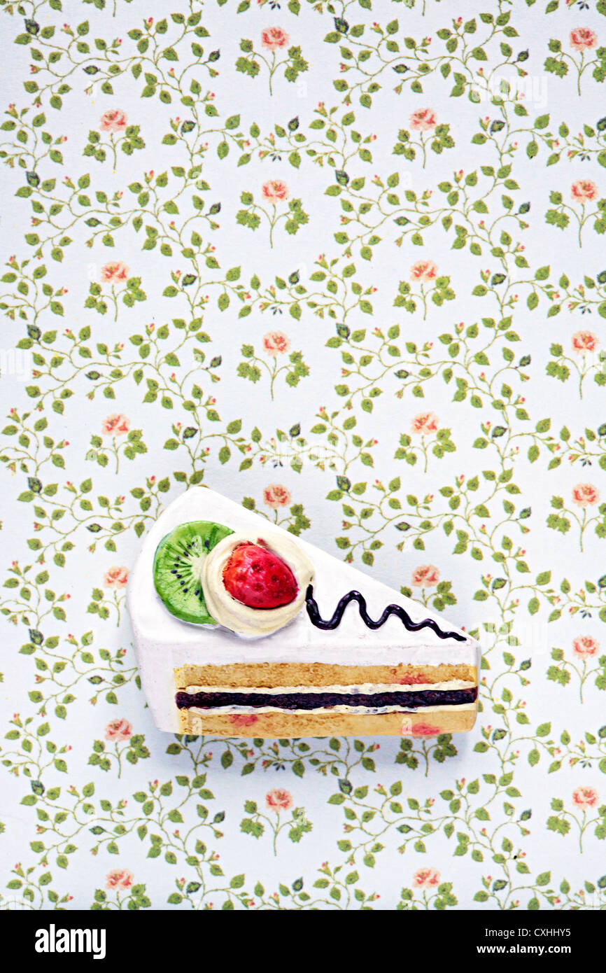 Torte-Tapete aufbringen, Kitsch-pastell Stockfoto