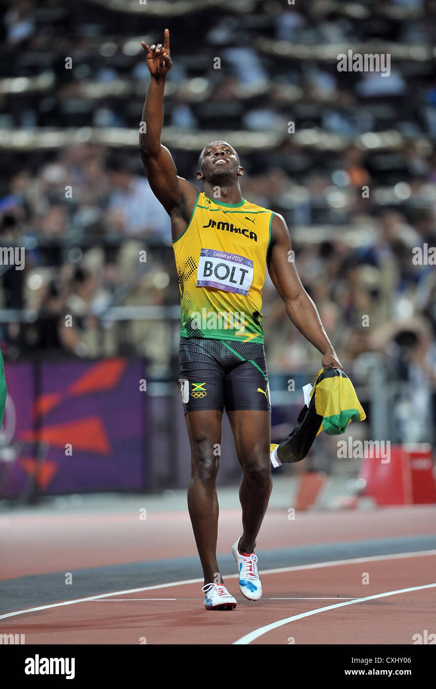 Jamaikas Usain Bolt zeigt auf den Himmel. Stockfoto