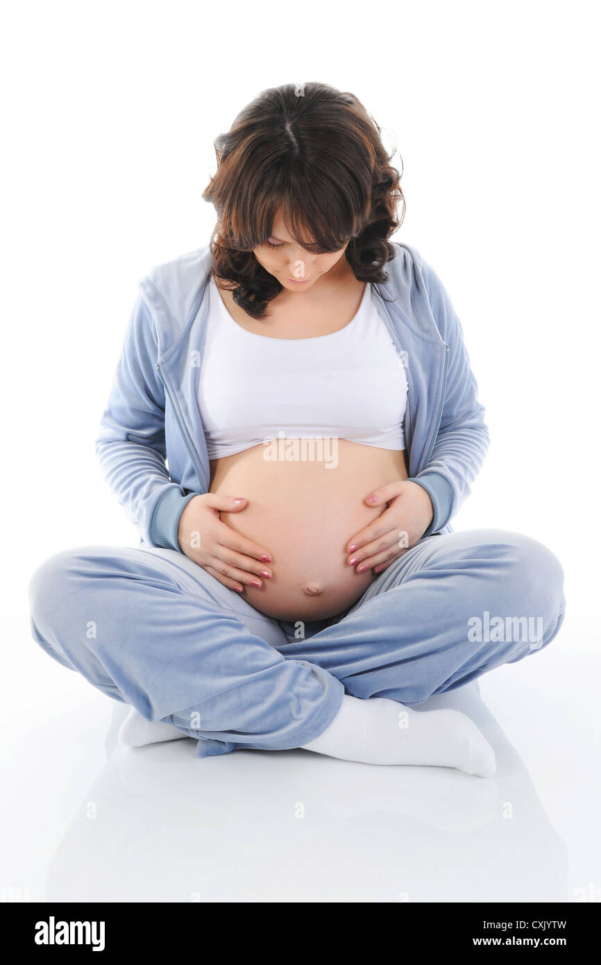 schöne junge schwangere Frau Stockfoto