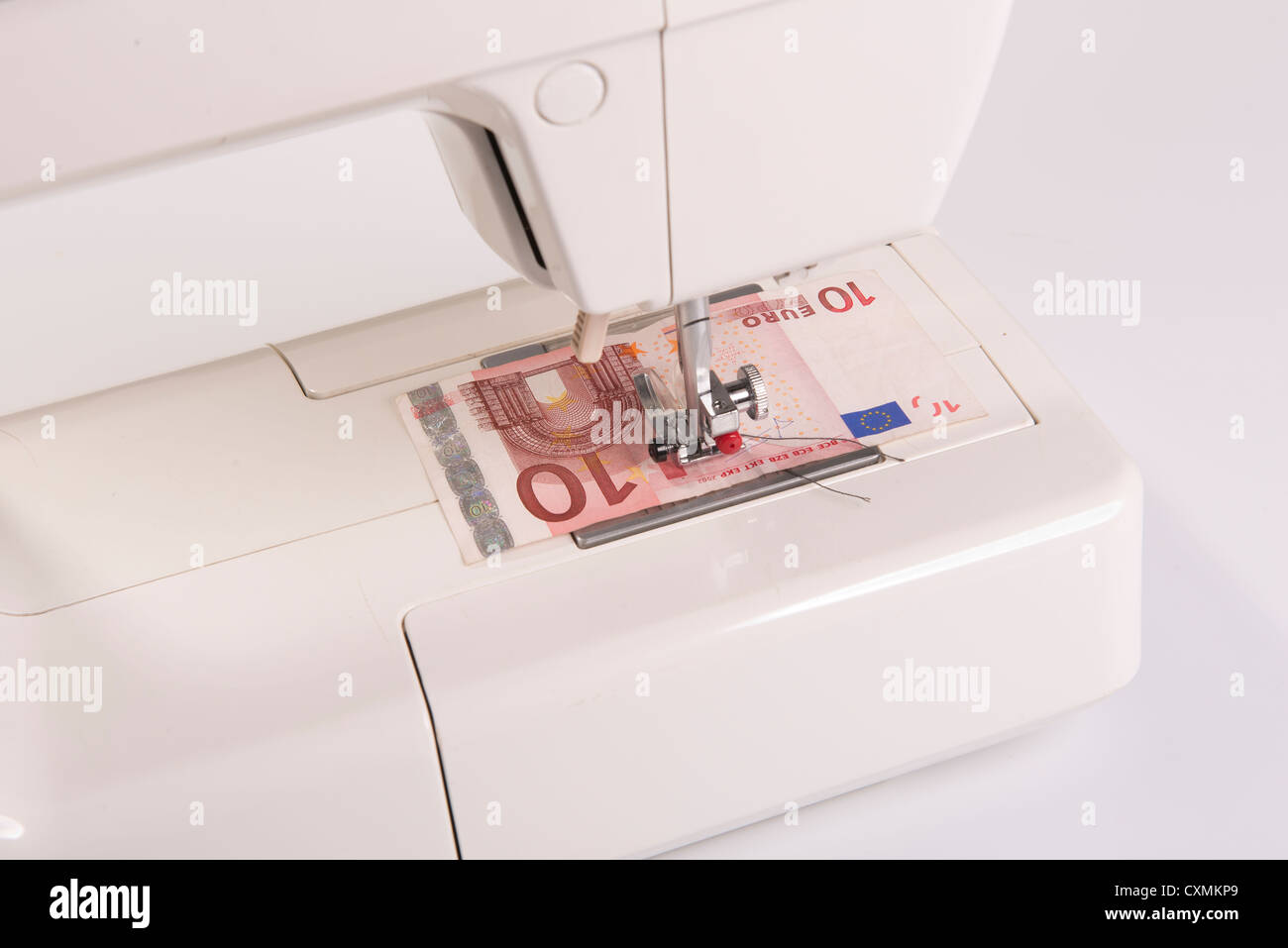 Nähen eine Euro-banknote Stockfoto