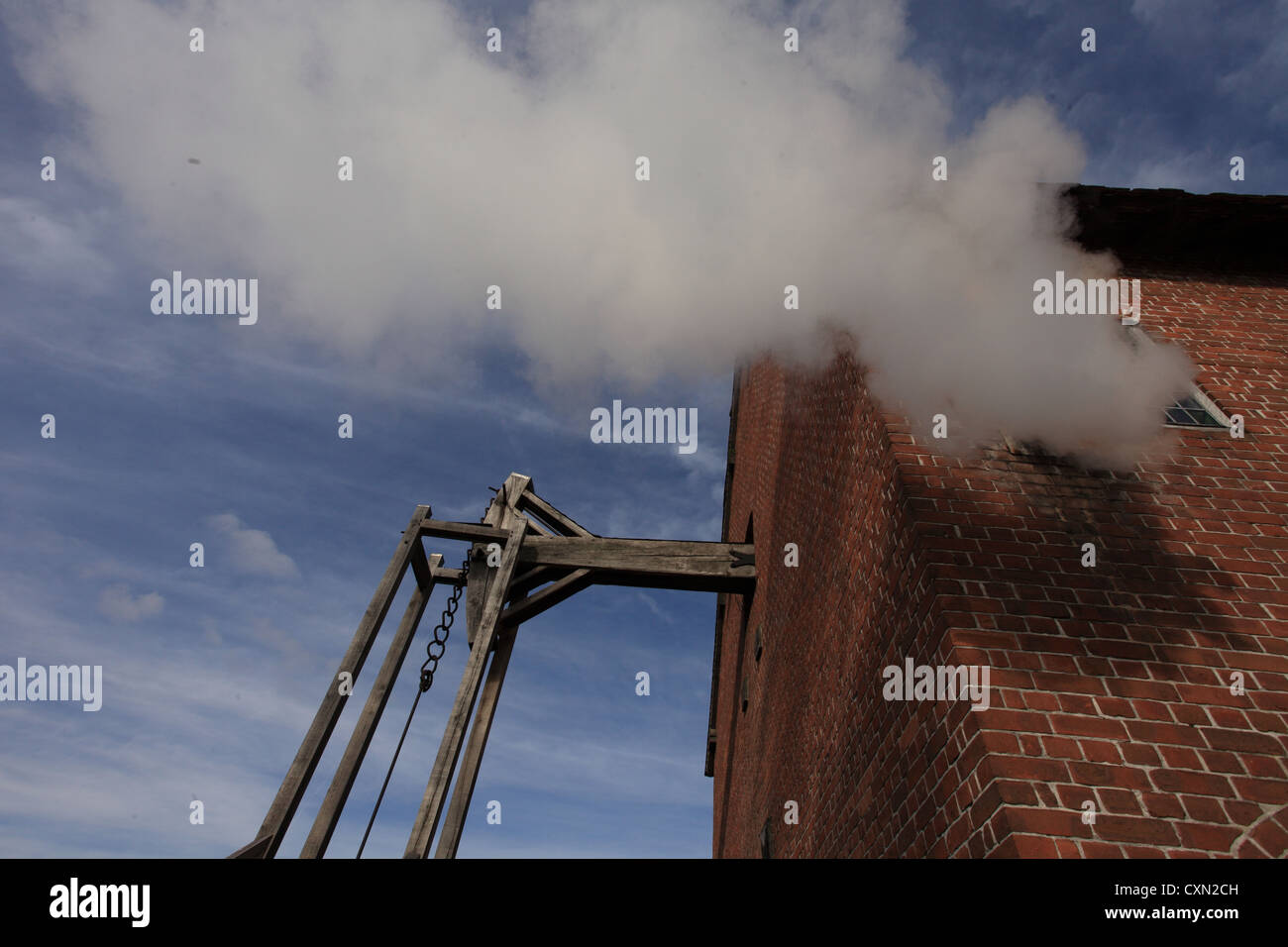 Arbeiten Newcomen-Dampfmaschine zu Pumpwasser aus gefluteten Kohlegruben im Taeger Jahrhundert in Großbritannien verwendet. Stockfoto