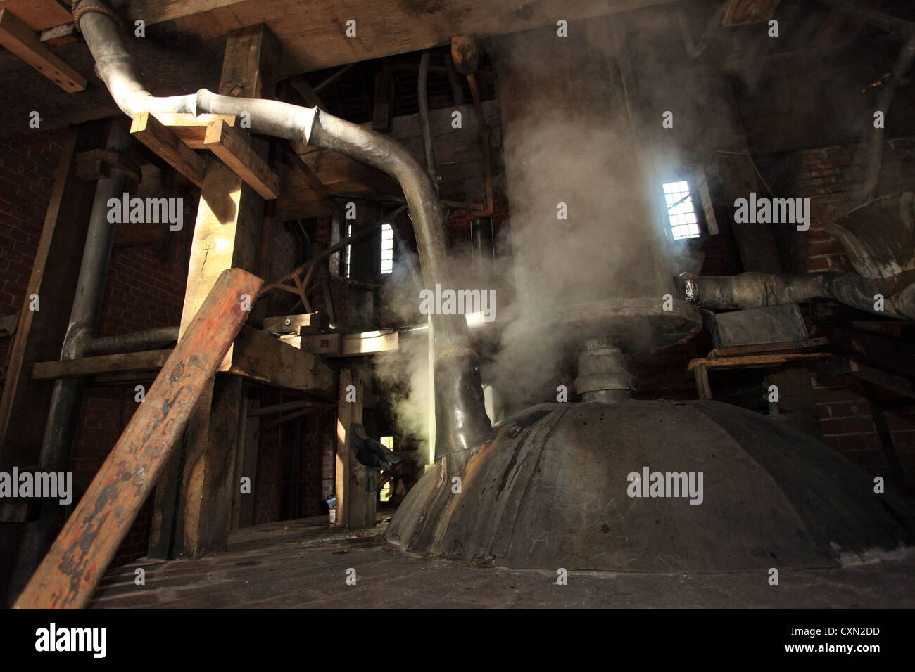 Arbeiten Newcomen-Dampfmaschine zu Pumpwasser aus gefluteten Kohlegruben im Taeger Jahrhundert in Großbritannien verwendet. Stockfoto