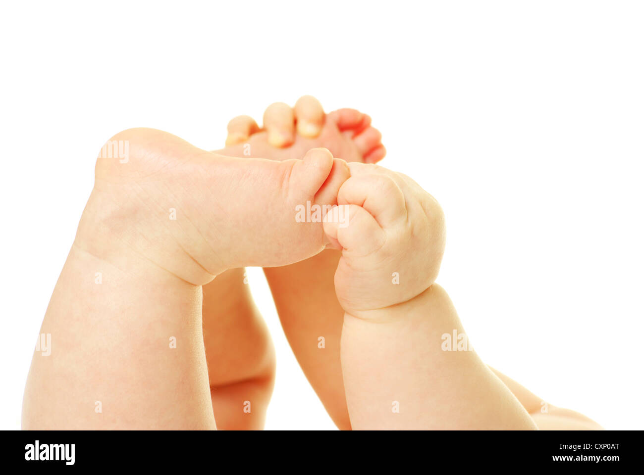 neugeborenes Baby Füße und Hände isoliert auf weiss Stockfoto
