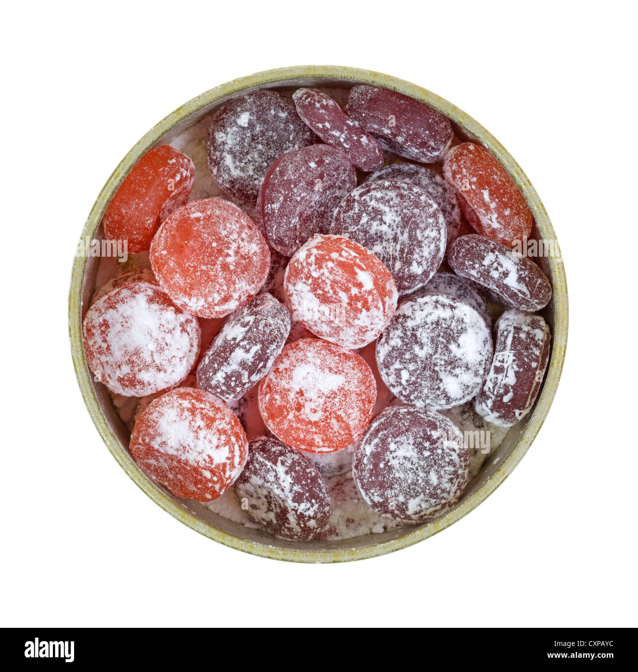Eine kleine Dose gefüllt mit Bonbons in Fruchtaromen mit Puderzucker bestäubt. Stockfoto