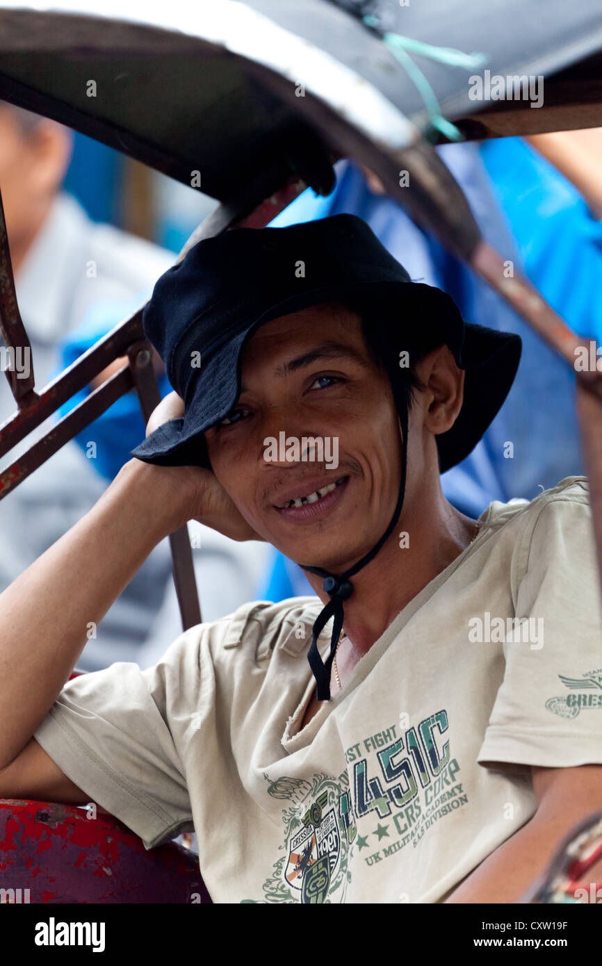 Rikscha-Fahrer in Banjarmasin, Indonesien Stockfoto