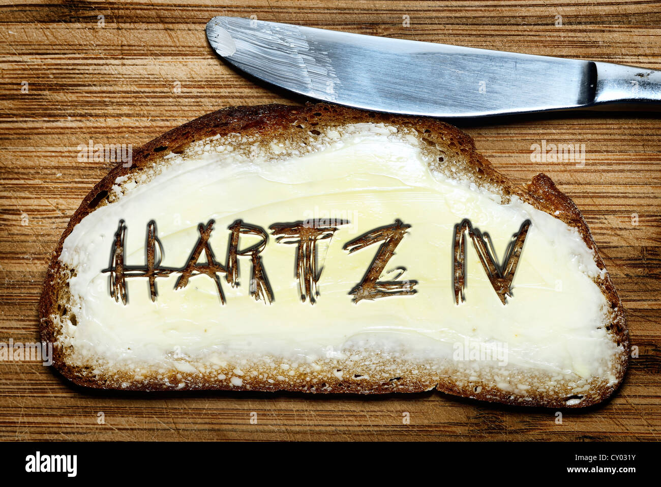 Schriftzug "Hartz IV" auf ein Sandwich, symbolisches Bild für Hartz 4 Stockfoto