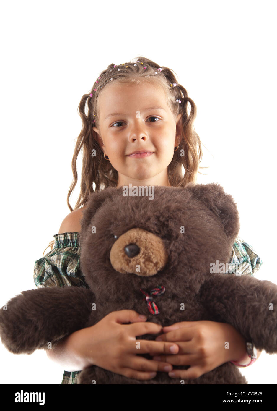 Hübsches kleines Mädchen mit Spielzeug, isoliert auf weißem Hintergrund Stockfoto