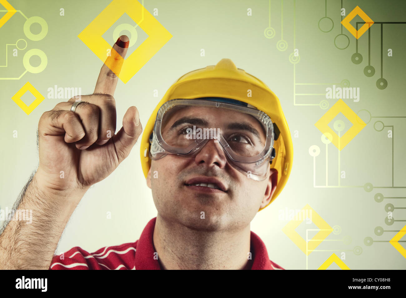 Bauingenieur mit futuristischen Touch-Screen-Display. Stockfoto Bauingenieur mit futuristischen Touch-Screen-Display. Stockfoto