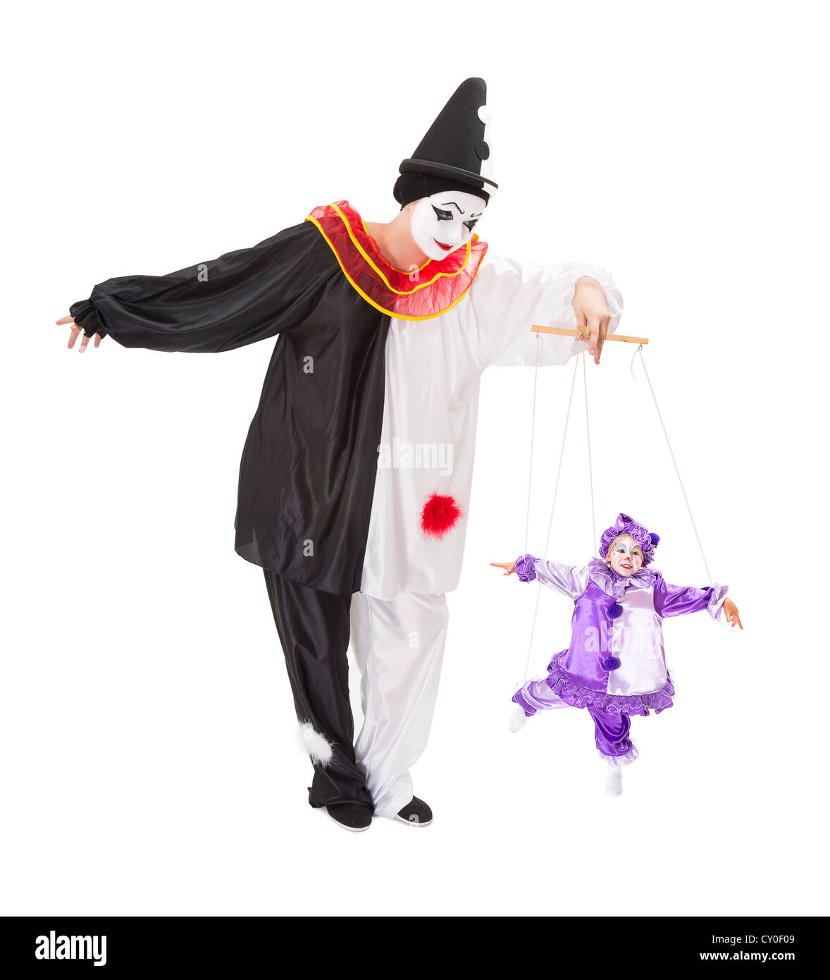 Pierrot mit einem lebenden Clown als Marionette Marionette auf Saiten spielen Stockfoto