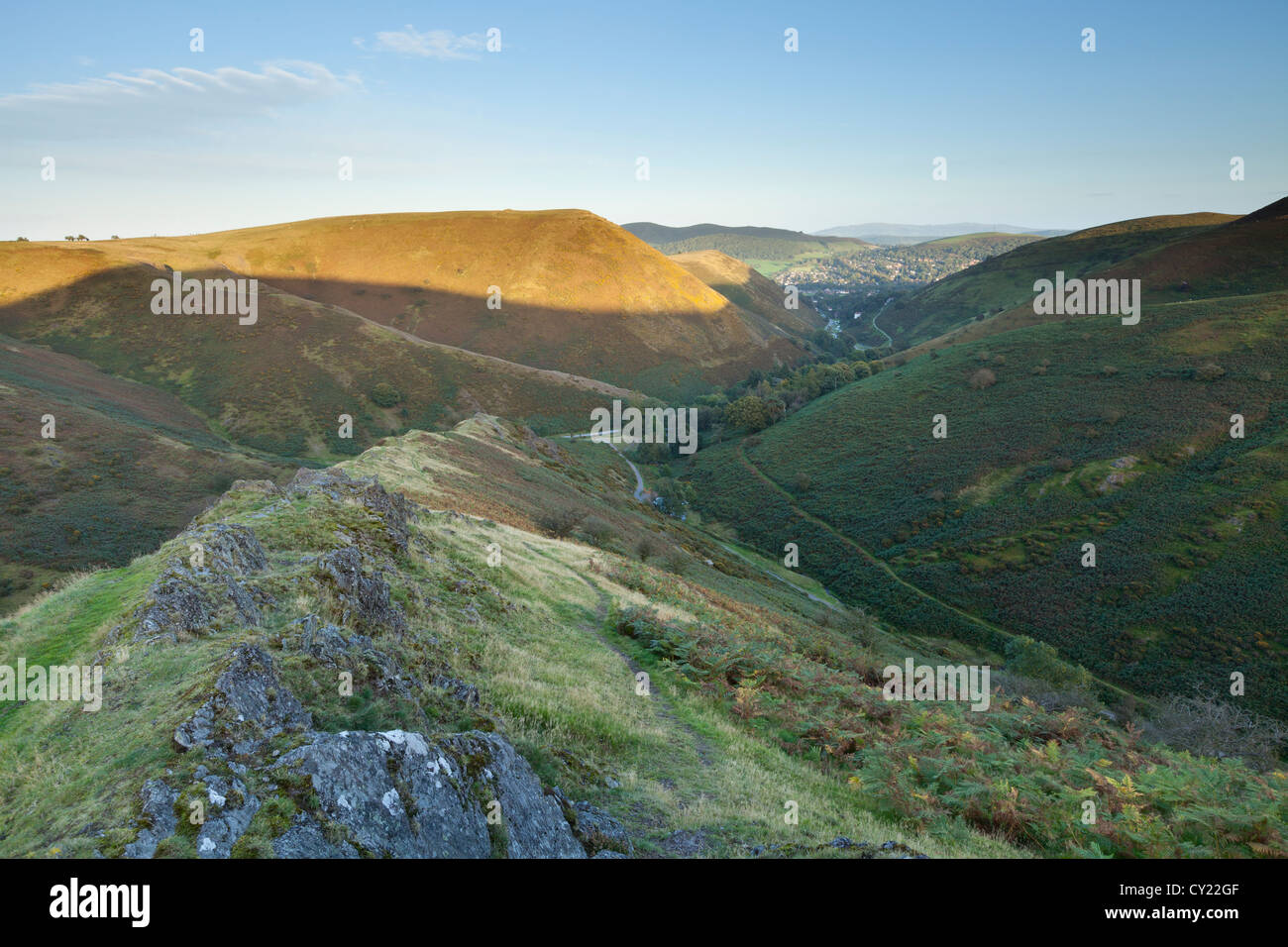 Die untergehende Sonne über dem Carding Mill Valley, Long Mynd in Shropshire Stockfoto