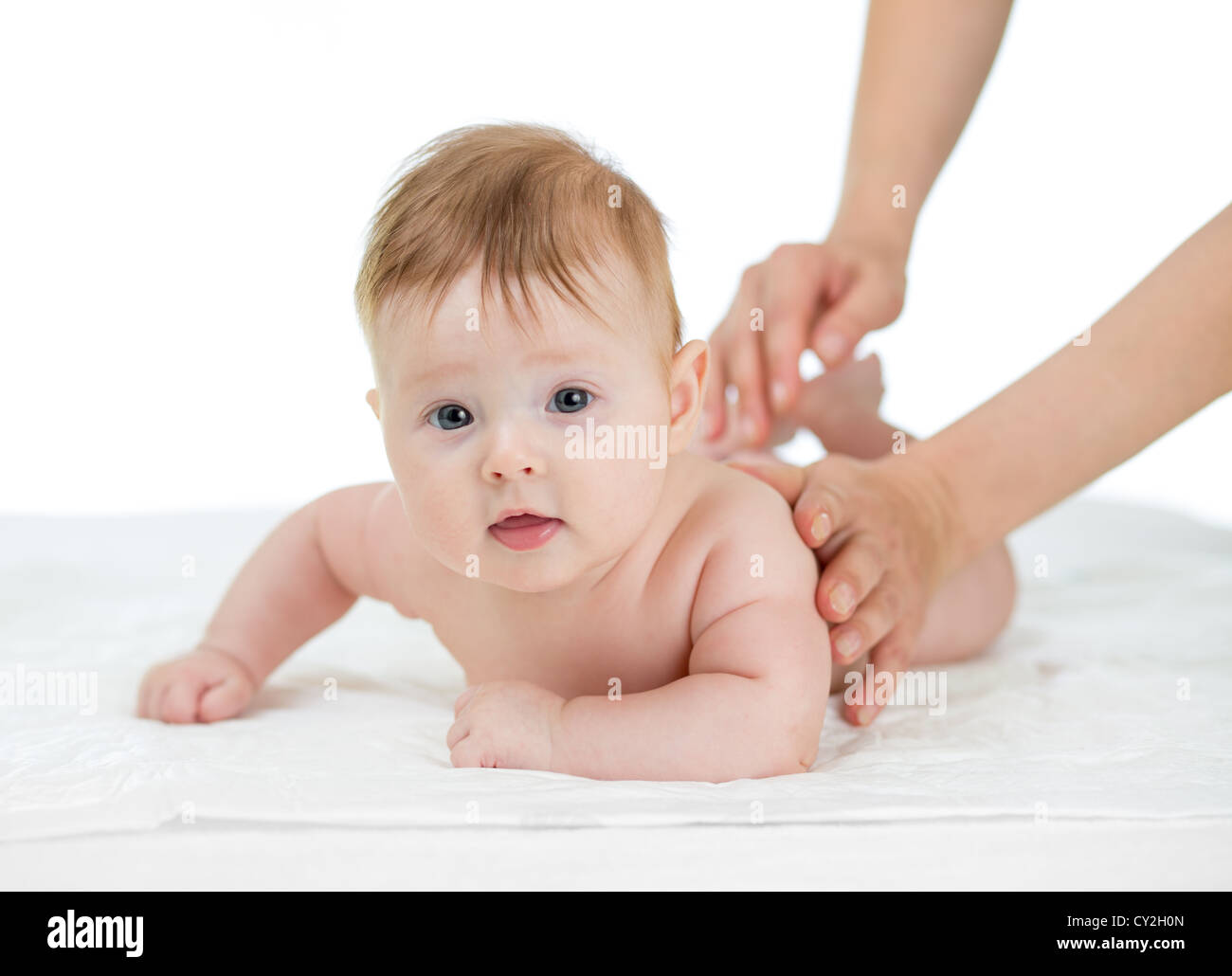 Baby immer Massagestudio erschossen auf weißem Hintergrund Stockfoto