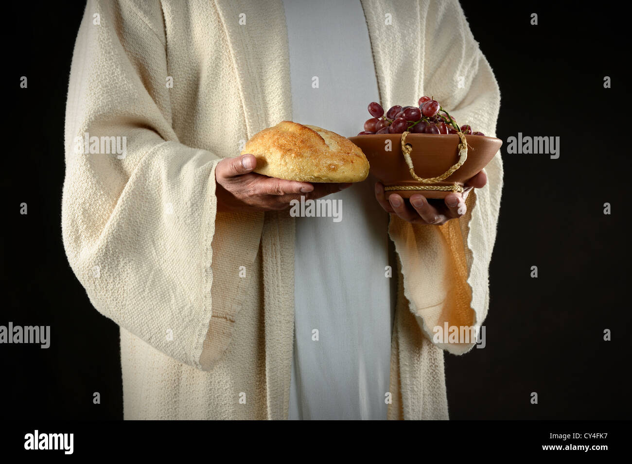 Jesus die Hände halten Brot und Trauben, Symbole der Gemeinschaft Stockfoto