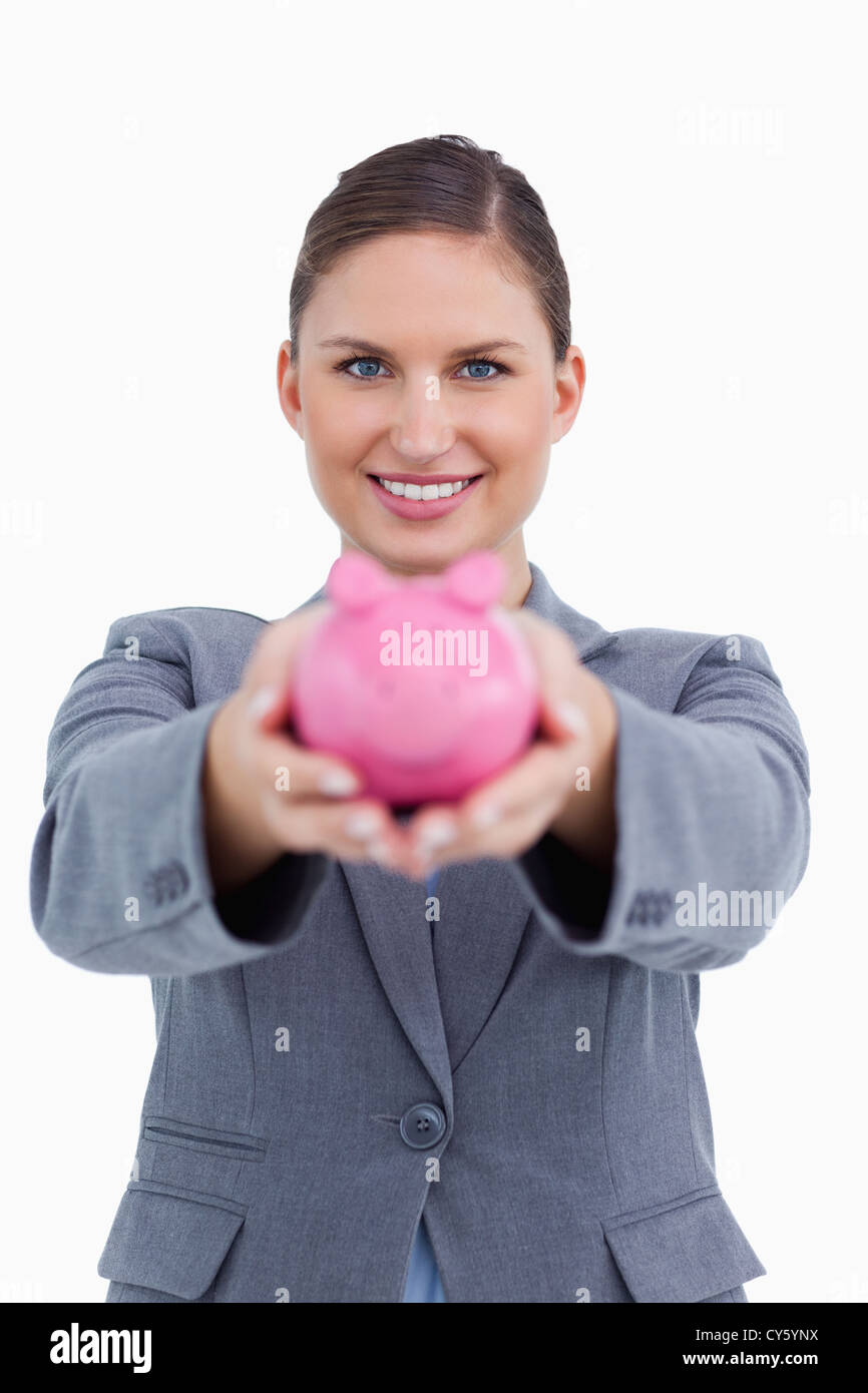 Lächelnde Bankkaufmann mit Sparschwein Stockfoto