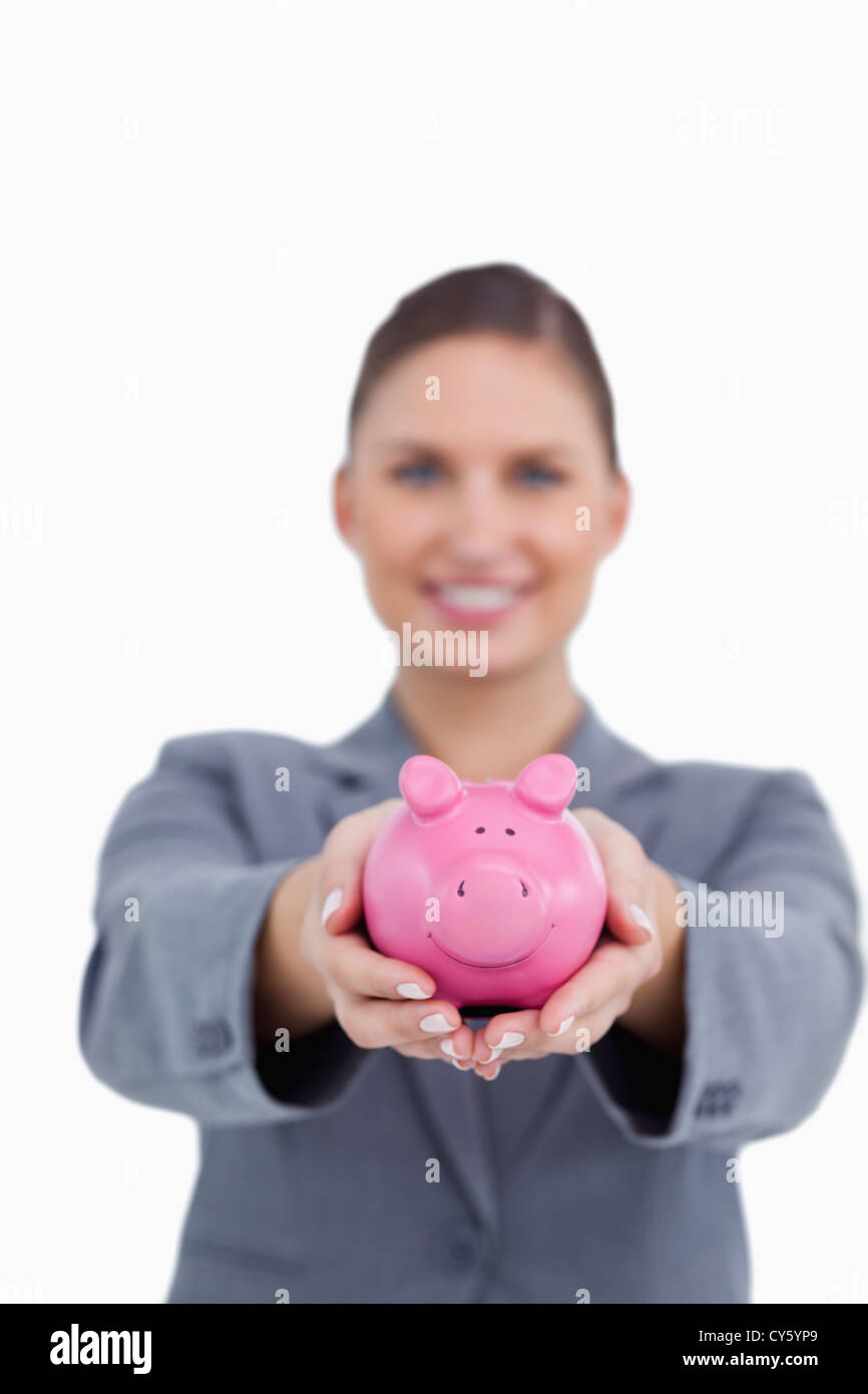 Sparschwein mit einem Lächeln Bankkaufmann angeboten werden Stockfoto