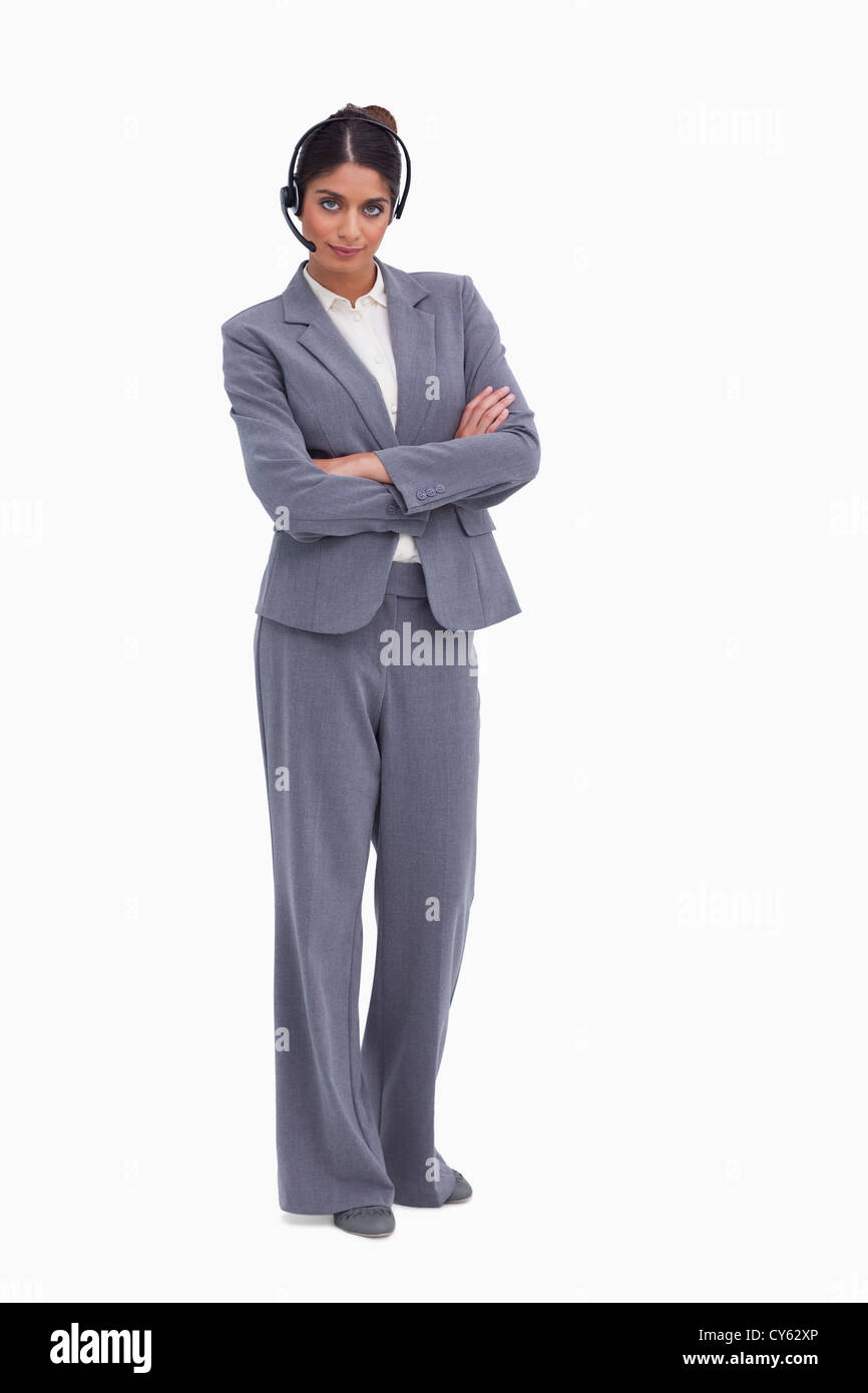 Weibliche Call-Center-Agenten mit ihren verschränkten Armen Stockfoto