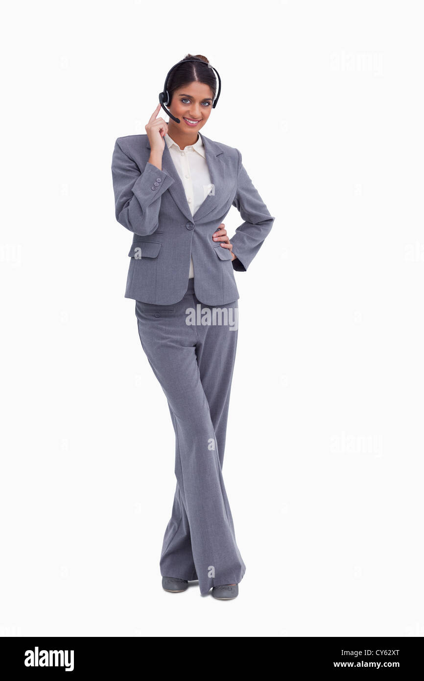 Weibliche Call-Center-Agenten mit gekreuzten Beinen Stockfoto