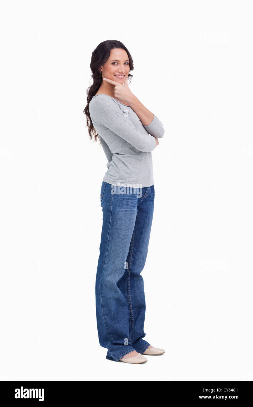 Seitenansicht des nachdenklich lächelnde Frau Stockfoto