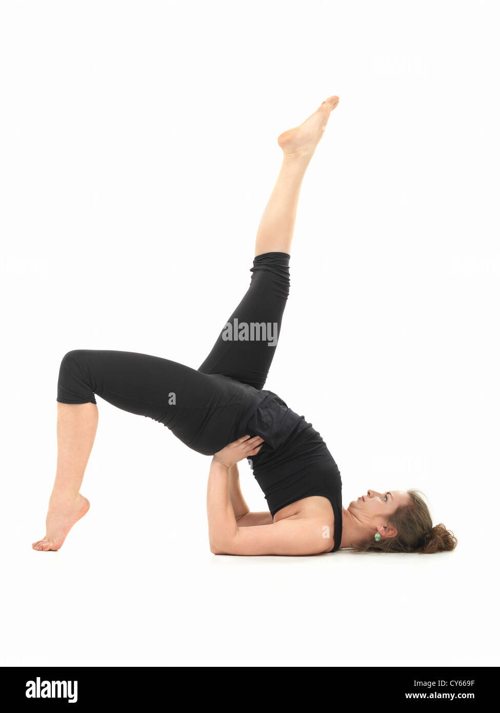 Kaukasische Mädchen bei der Abwägung der Yoga-pose Stockfoto