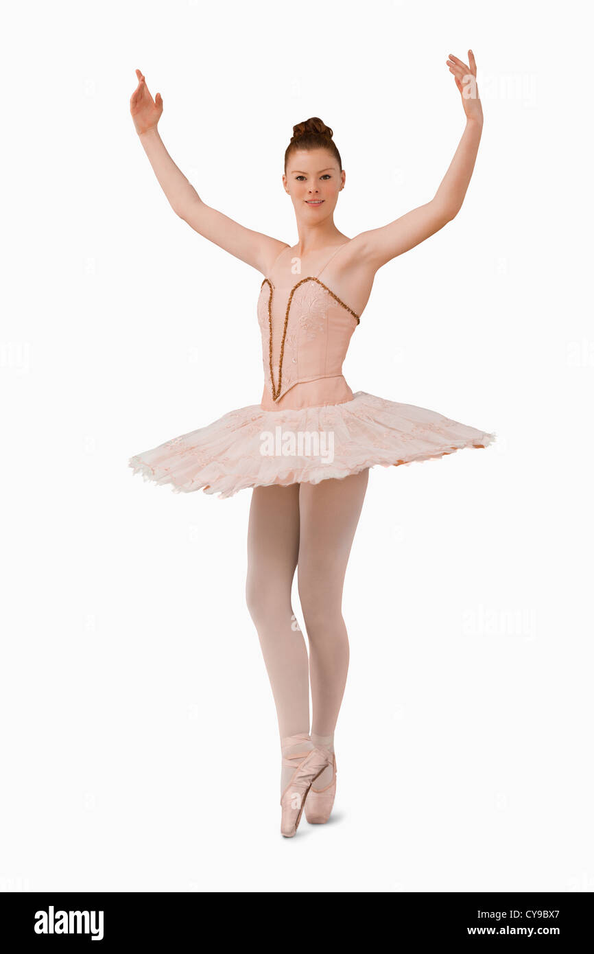 Ballerina mit ihren Armen gestiegen Stockfoto