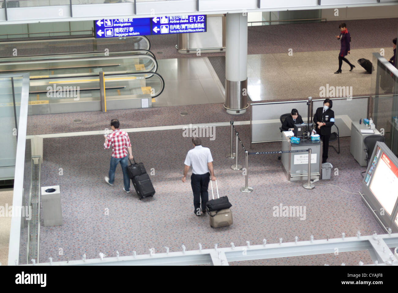 Grippe-Erkennung am Hong Kong international Airport Stockfoto