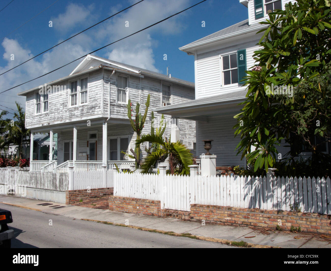 traditionelle Holzhäuser mit weißen Lattenzäune in der alten Stadt von Key West Florida usa Stockfoto
