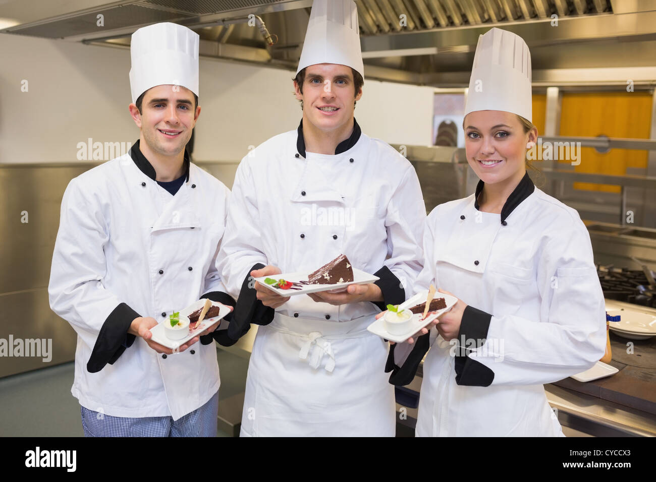 Drei Chef der Kuchen präsentieren. Stockfoto