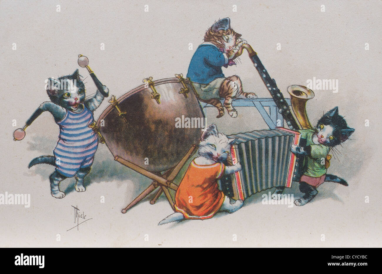 vier Katzen spielen in eine alte Postkarte Stockfoto