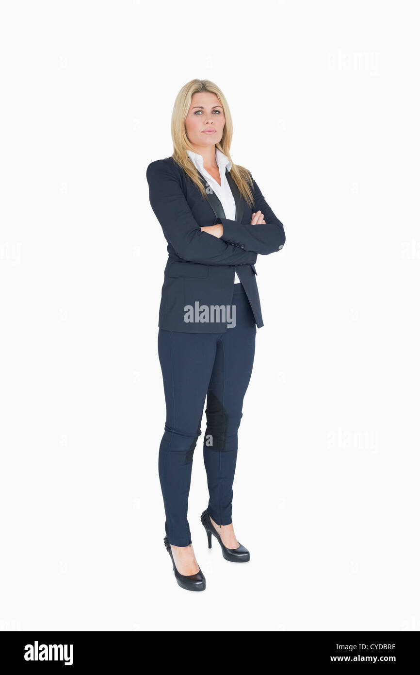 Geschäftsfrau, die ihre Arme kreuzen Stockfoto