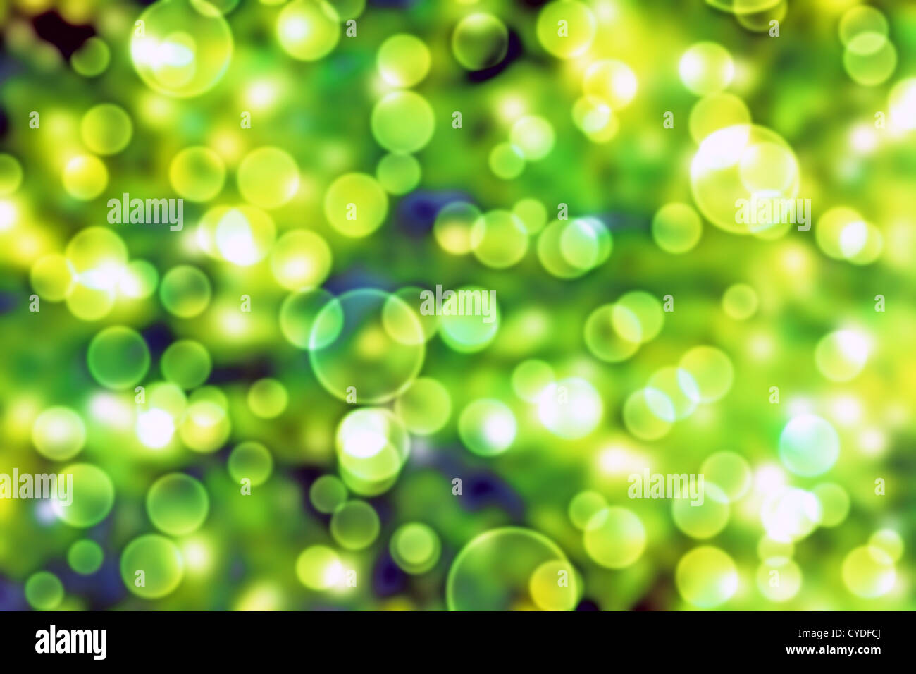 Lichtkreise auf grünem Hintergrund Stockfoto