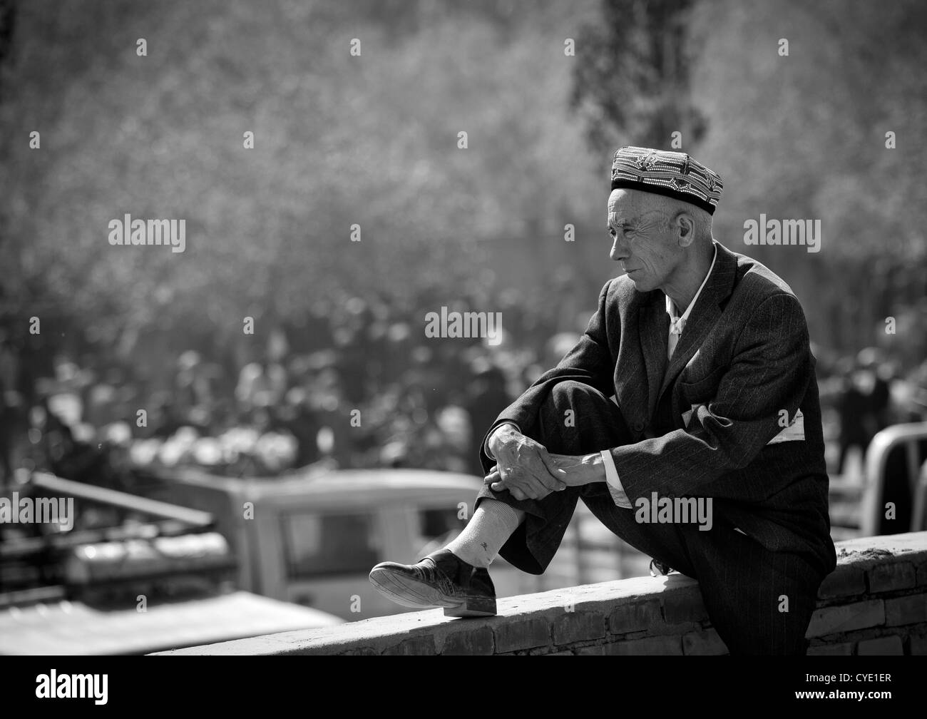 Uyghur Mann, Opal Dorfmarkt, Xinjiang Uyghur autonome Region, China Stockfoto