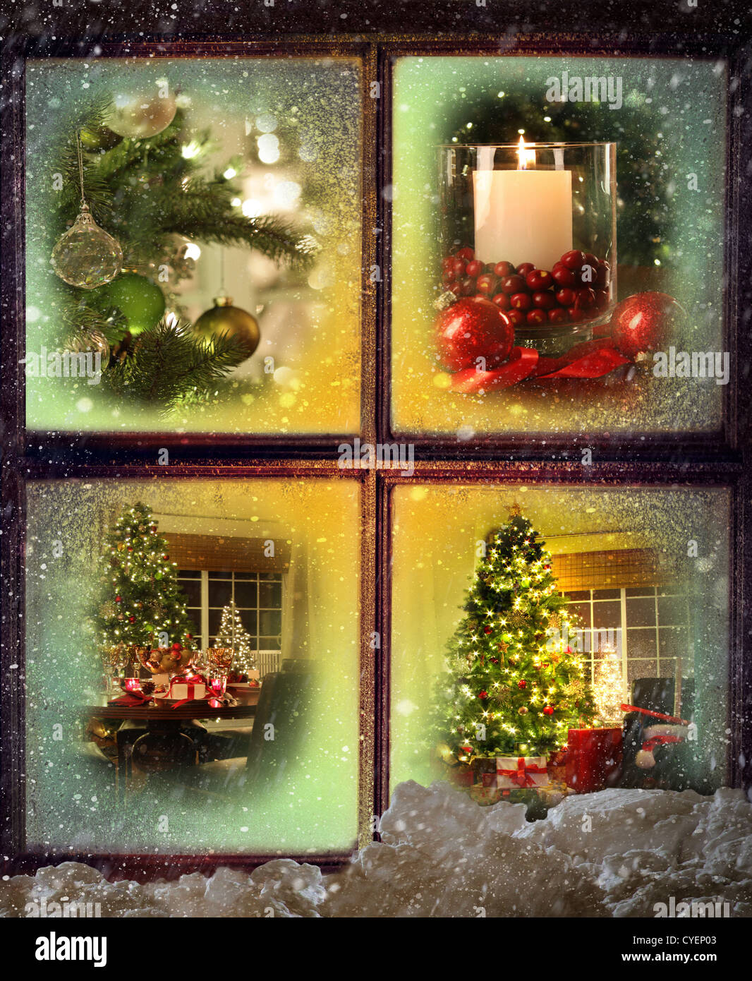 Vignetten von Weihnachtsszenen, gesehen durch ein Holzfenster Stockfoto
