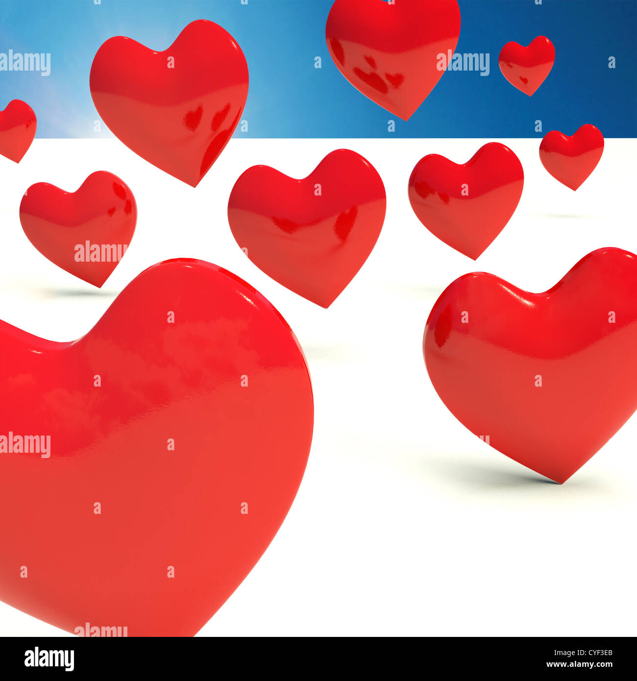 Fallende rote Herzen aus Liebe und Romantik Stockfoto