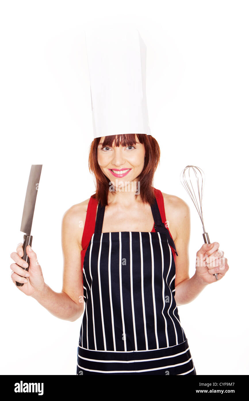Lächelnd Köchin mit Küchenausstattung auf weißem Hintergrund Stockfoto